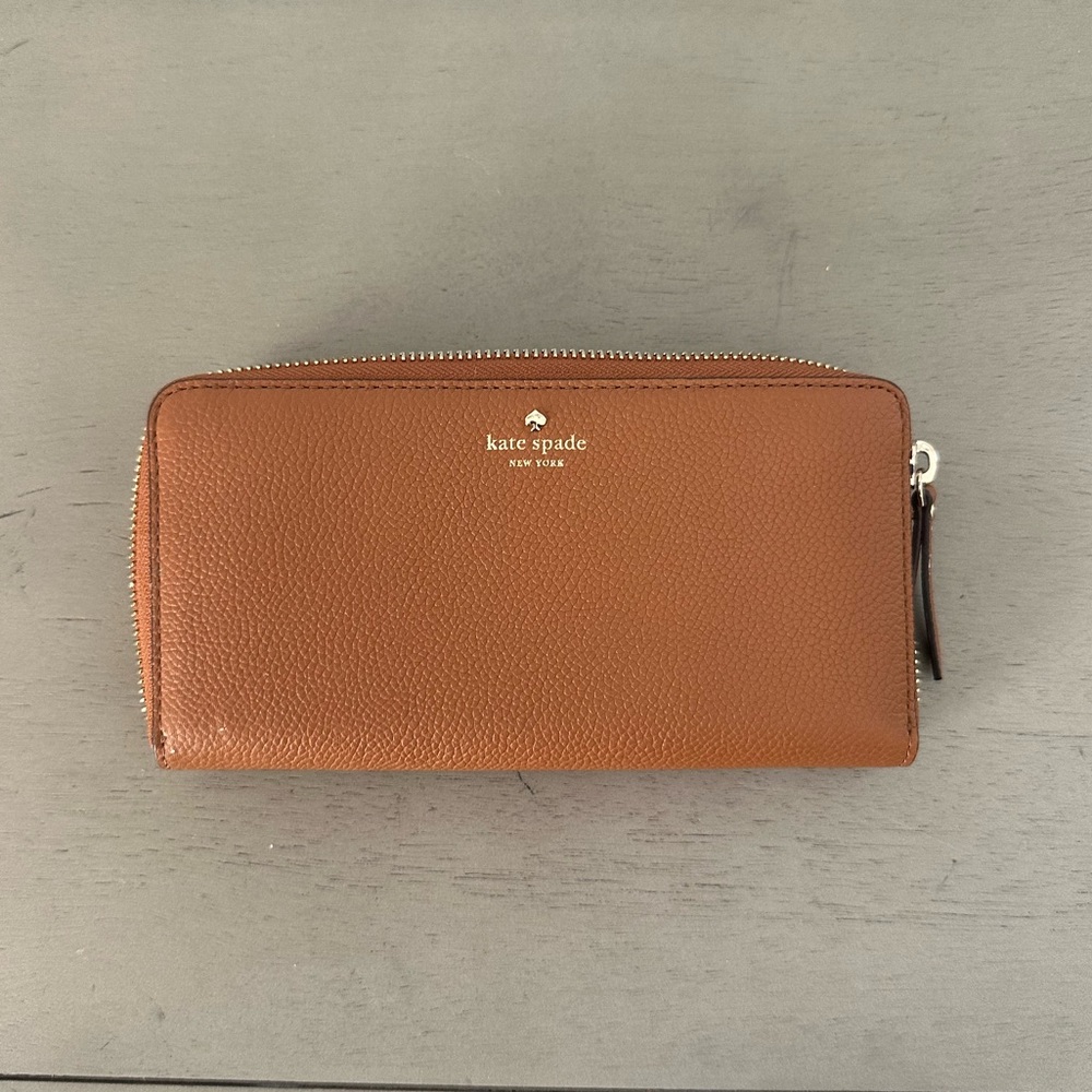 Light brown never used Kate Spade wallet.